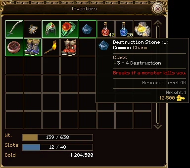 The tooltip of Destruction Stone (L) over the bag: Common Charm, 3 to 4 destruction, Breaks if a monster kills you in red, requires level 40, weight 1 and 12,500 gold.